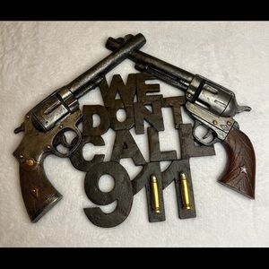 Decorative Wall Art with Revolvers and Text